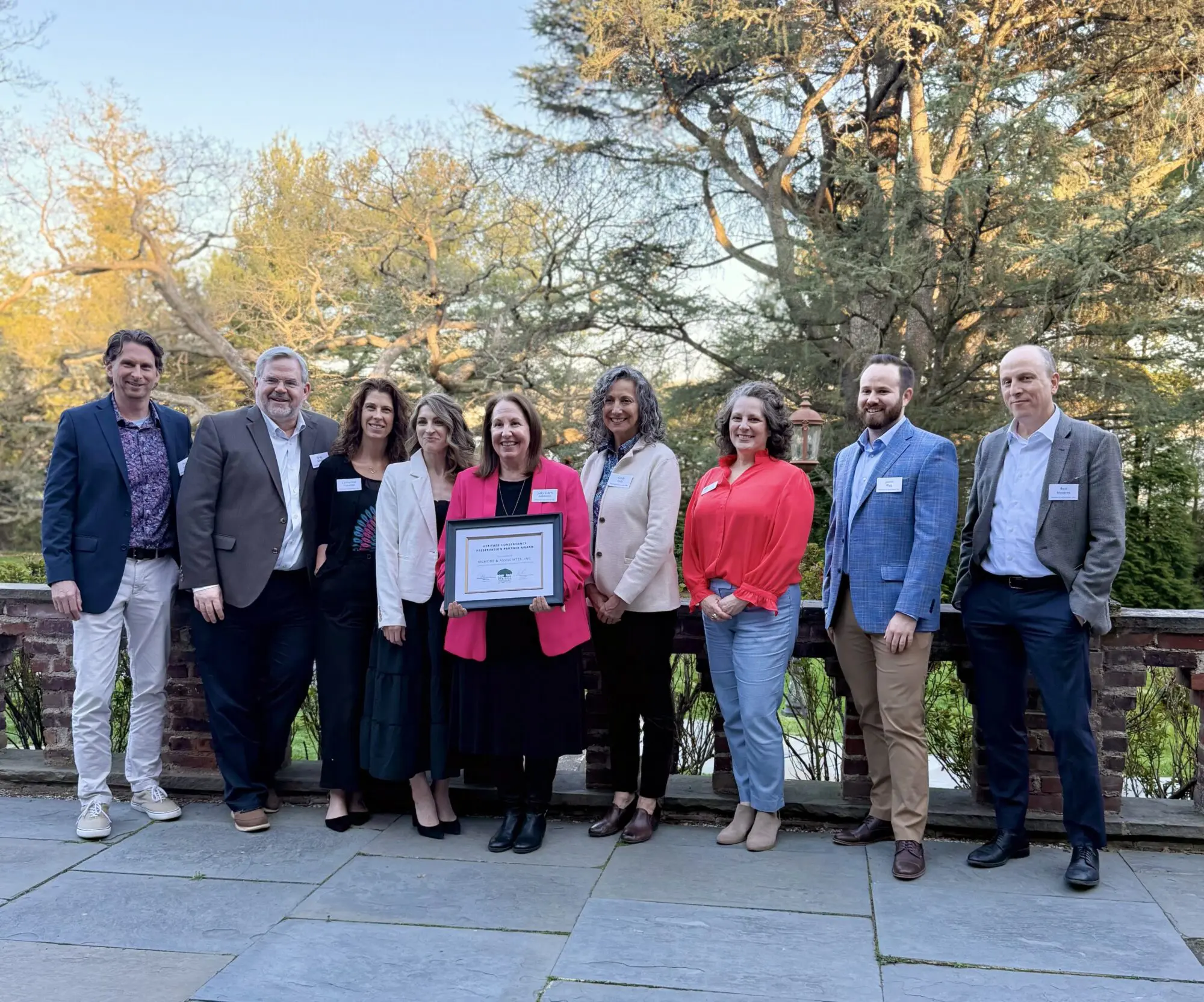 Team members from Gilmore & Associates accept the Preservation Partner Award at the Business Partners Reception