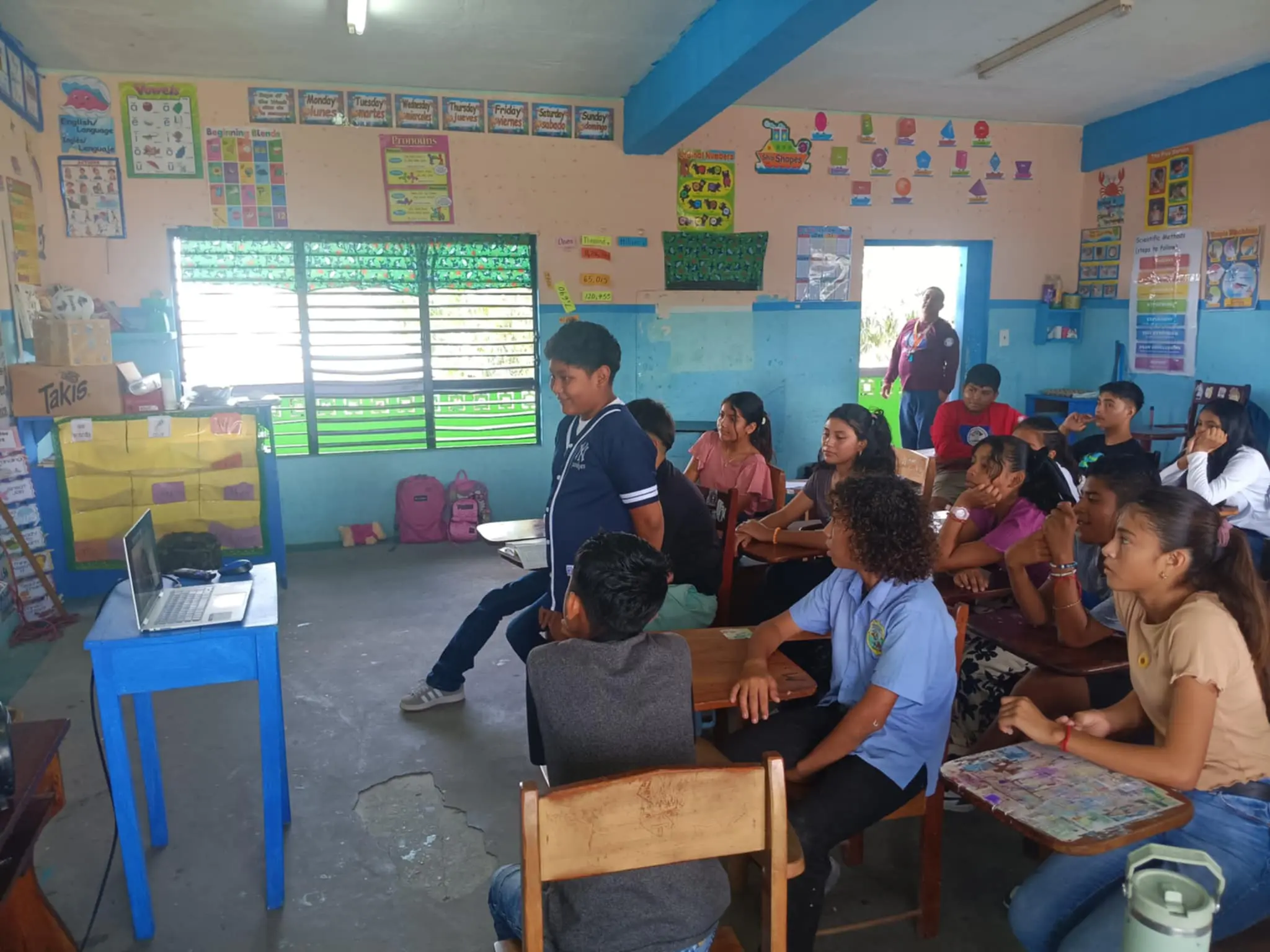 A picture of St. Michael R.C. students participating in a Zoom presentation with Keystone students