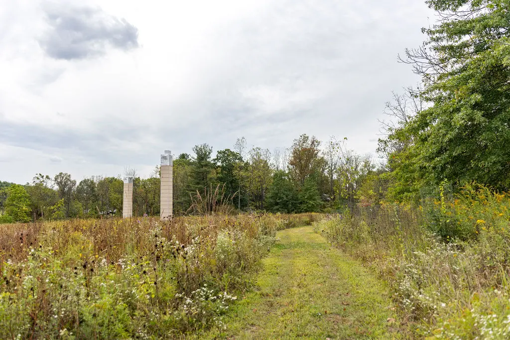 chimney swift nesting boxes in a meadow